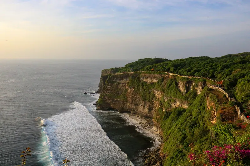 Uluwatu Temple perched on a dramatic clifftop above the ocean