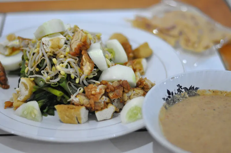 A plate of gado-gado, an Indonesian vegetable salad with peanut sauce