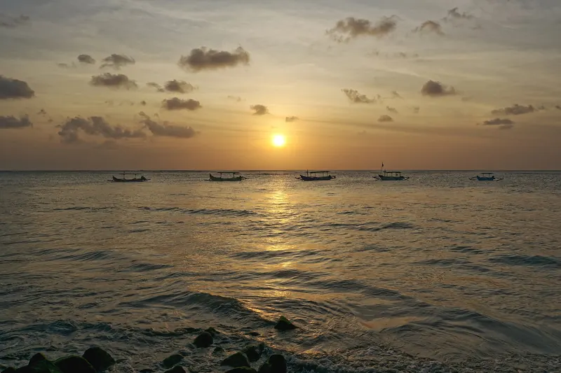 Sunset over the ocean at Kuta Beach, Bali