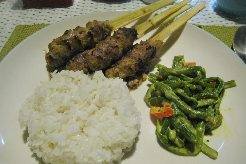 Sate lilit, minced Balinese satay wrapped around skewers