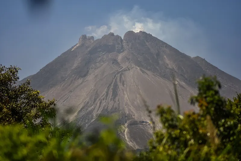 A jeep tour crossing Mount Merapi's volcanic slopes