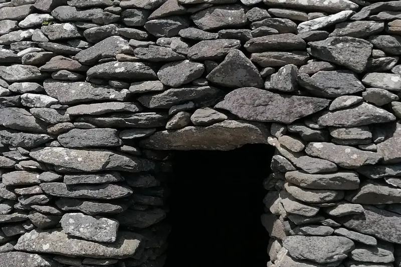 Ancient stone beehive huts along the Slea Head Drive