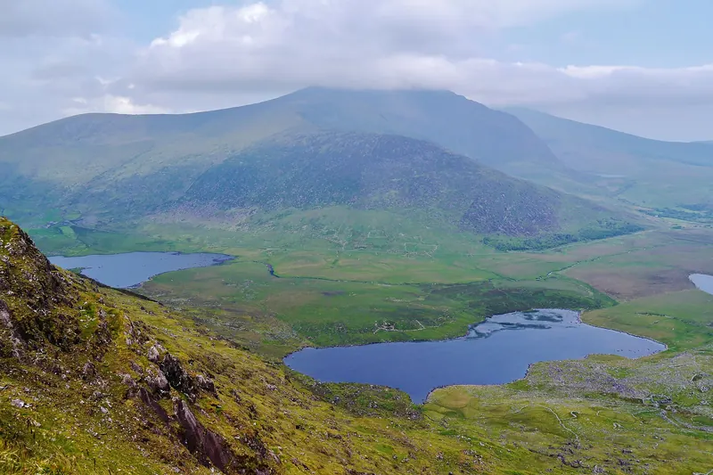 The road climbing over Conor Pass on the Dingle Peninsula