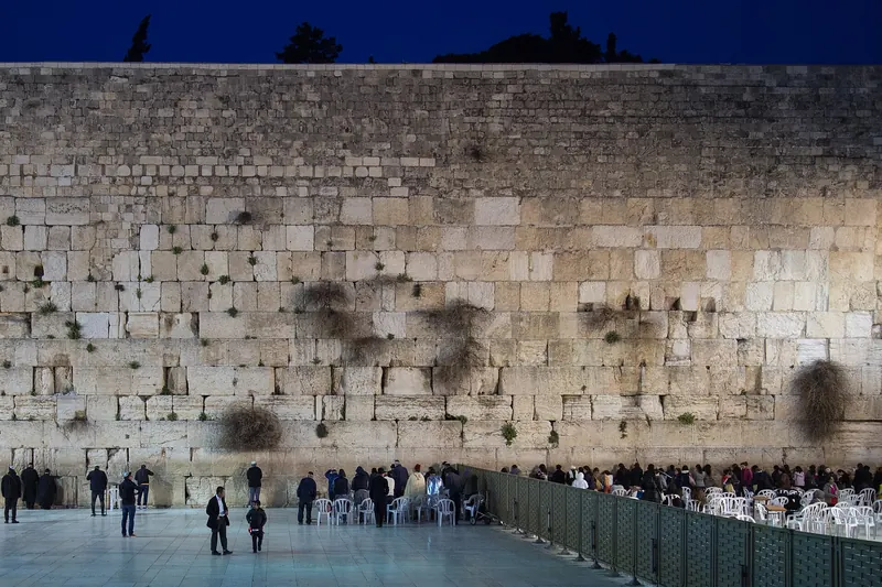 Worshippers at the Western Wall in Jerusalem's Old City at night