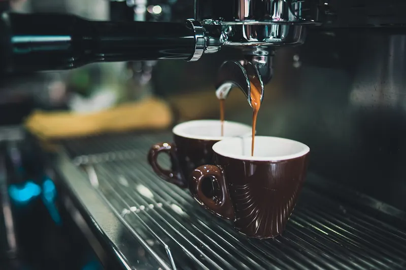 Espresso cups at a bar counter