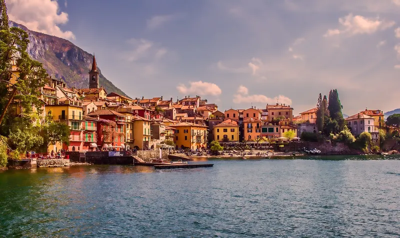 The lakeside village of Varenna on Lake Como with mountains rising behind it