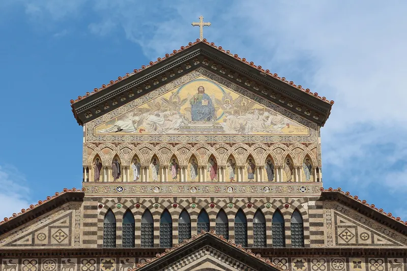 The striped Norman-Arab facade of Amalfi's cathedral above its wide staircase