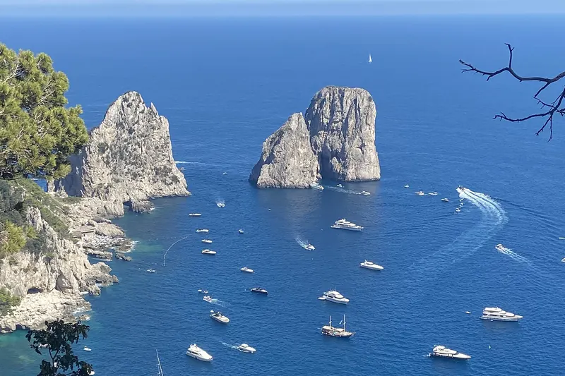 The Faraglioni rock stacks off Capri seen from a boat