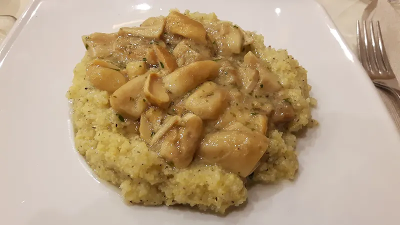 Soft polenta served with mushrooms