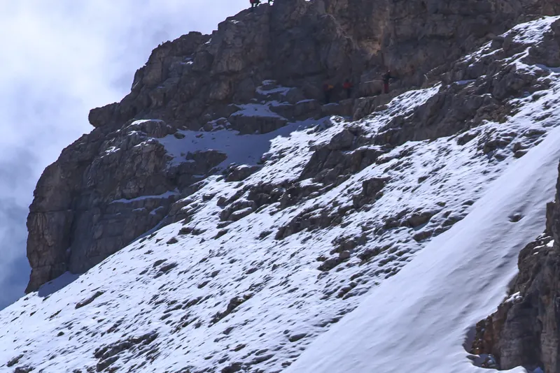 The start of a via ferrata route with fixed cables above the Cortina area