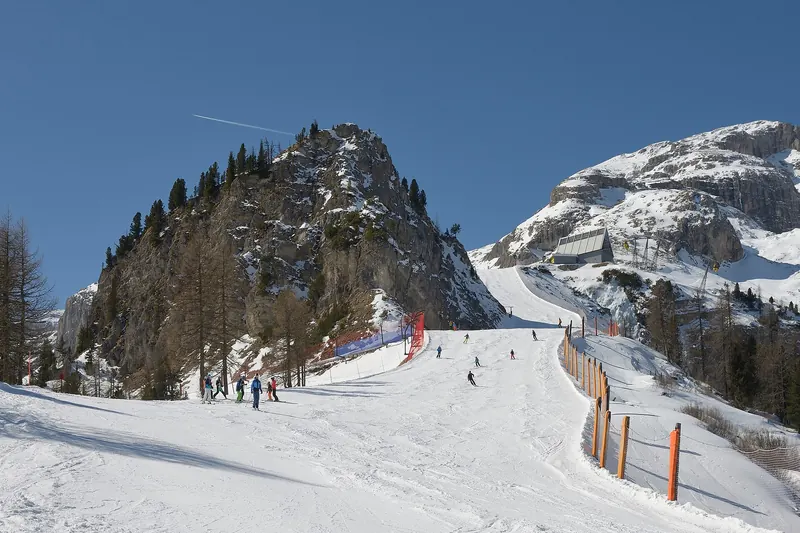A ski run beneath the Sella massif in winter