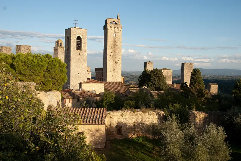 The medieval tower-houses of San Gimignano rising above the Tuscan hills