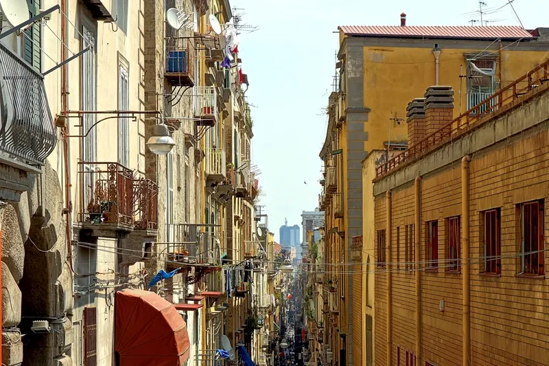 The narrow street of Spaccanapoli running through Naples' historic centre