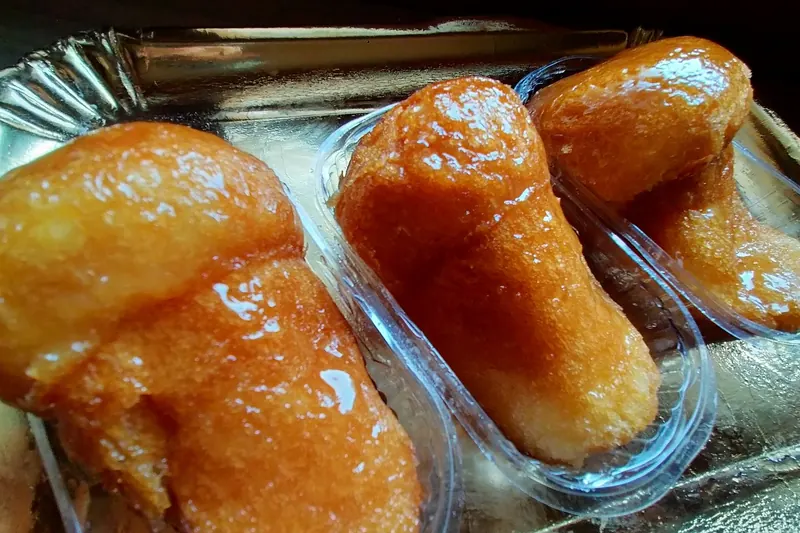 A babà, soaked in rum syrup until barely holding together