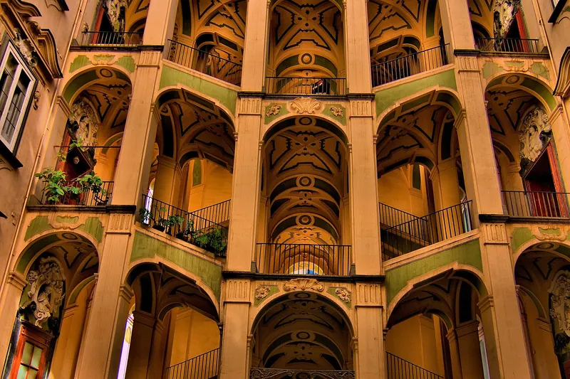 The theatrical double staircase of the Palazzo dello Spagnolo in the Sanità