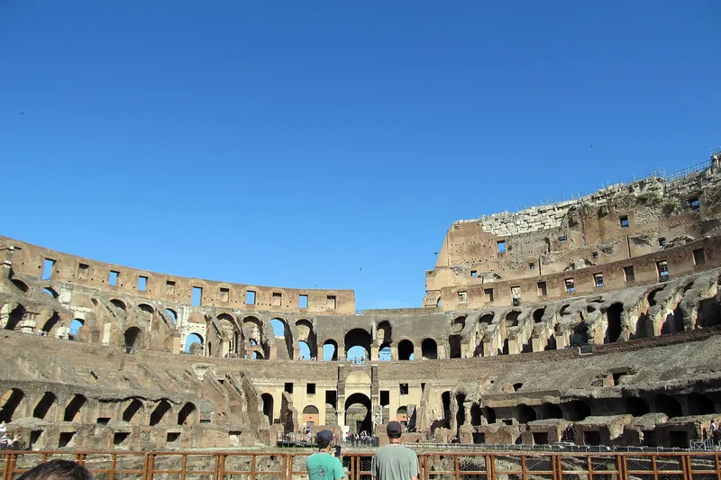 The tiered interior of the Colosseum with the exposed hypogeum beneath the missing arena floor