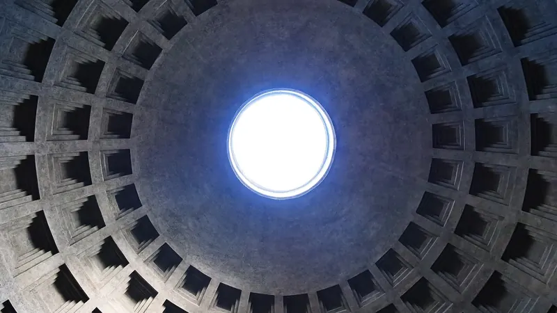 Light falling through the oculus onto the coffered dome inside the Pantheon