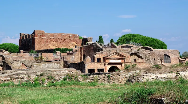 The excavated streets and brick ruins of the Roman port city of Ostia Antica
