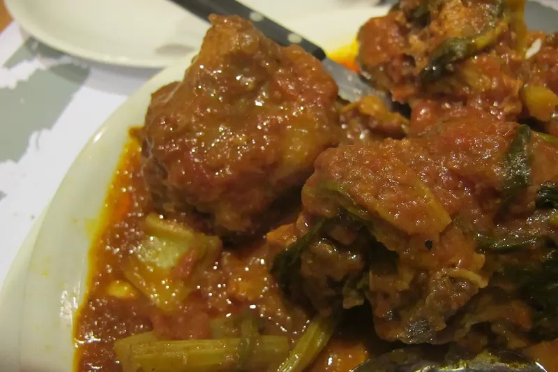 A bowl of coda alla vaccinara, oxtail braised with celery and tomato