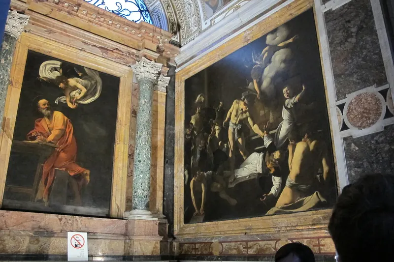 Caravaggio's Inspiration and Martyrdom of St Matthew hanging in the Contarelli Chapel