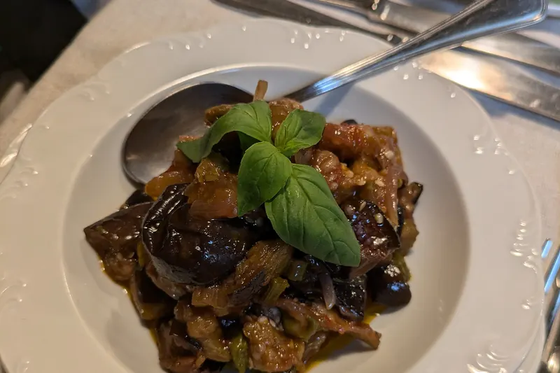 Caponata, aubergine cooked down with celery, olives and capers