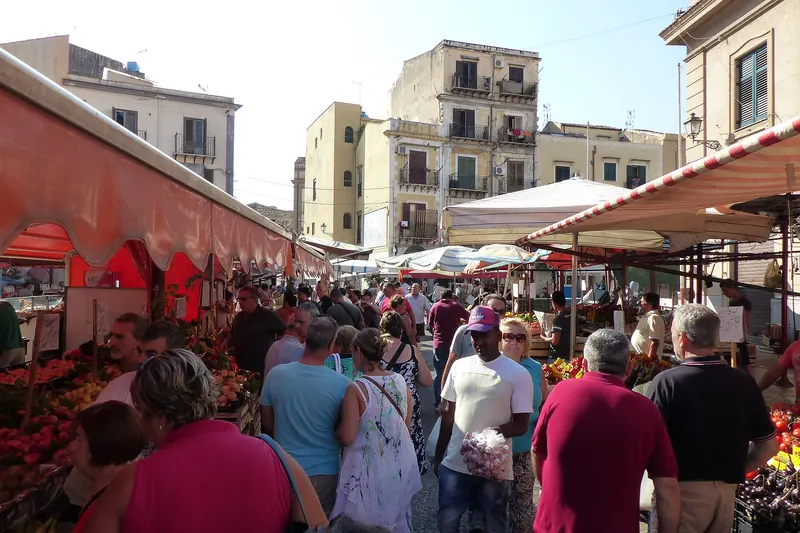Shoppers and stalls in Palermo's Ballarò market
