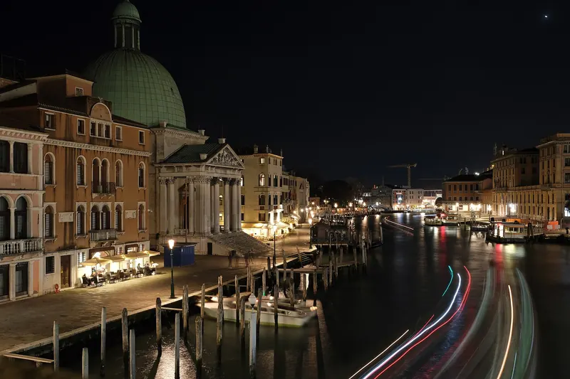 Palace facades lining the Grand Canal near the Ponte degli Scalzi