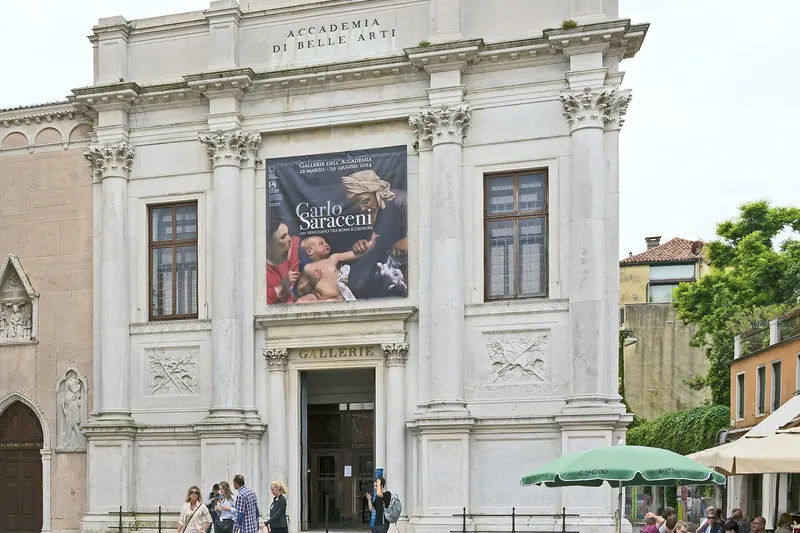 The stone facade of the Gallerie dell'Accademia on its Venice square