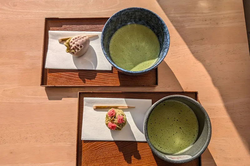Whisked matcha tea served with delicate wagashi sweets