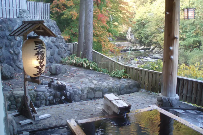 A traditional outdoor onsen bath, a signature part of the region's hot-spring culture