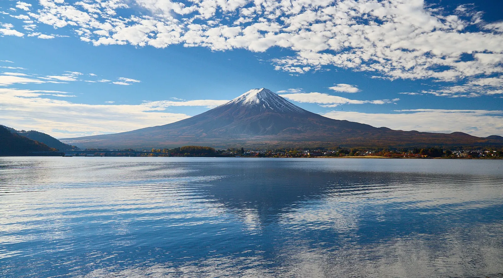 Mount Fuji's snow-capped peak reflected in Lake Kawaguchiko