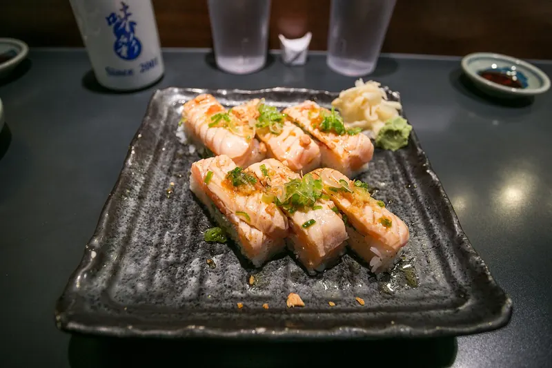 Osaka-style pressed sushi, rice and toppings shaped in a mould