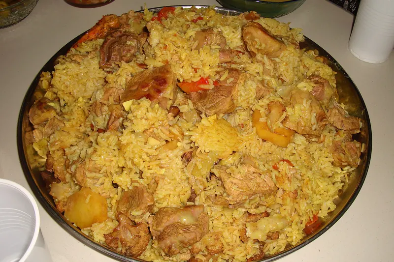 Maqluba, an upside-down dish of rice, meat and vegetables, turned out onto a platter