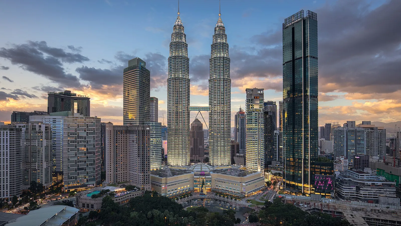 The Petronas Towers rising over Kuala Lumpur at dusk