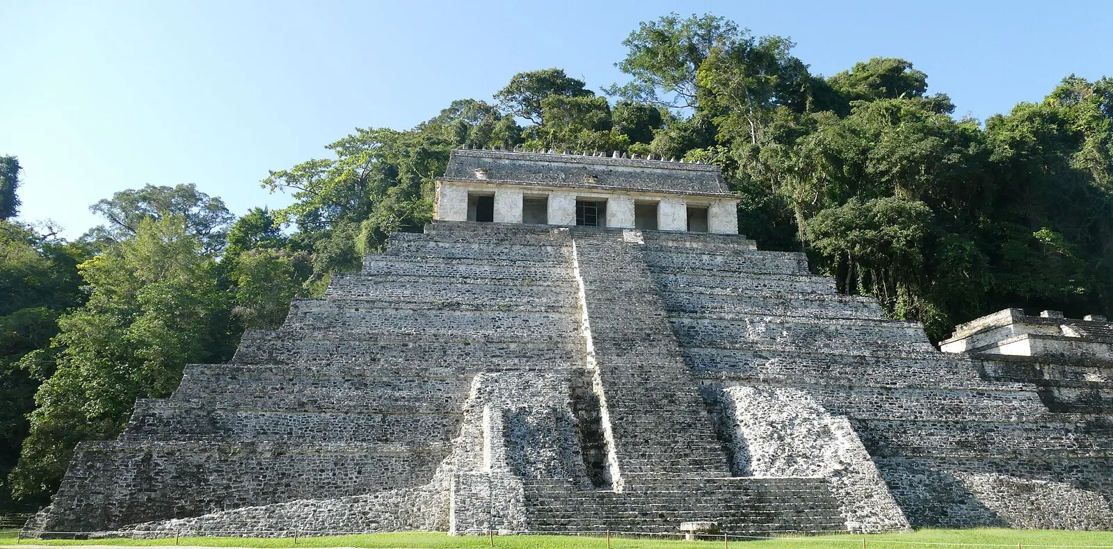 The Temple of the Inscriptions at Palenque rising above the jungle