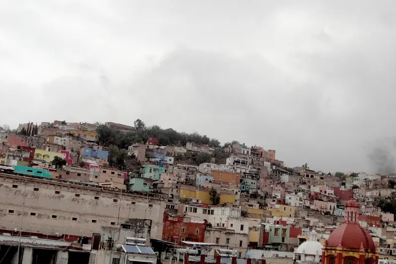 The colourful houses of Guanajuato packed into a hillside valley