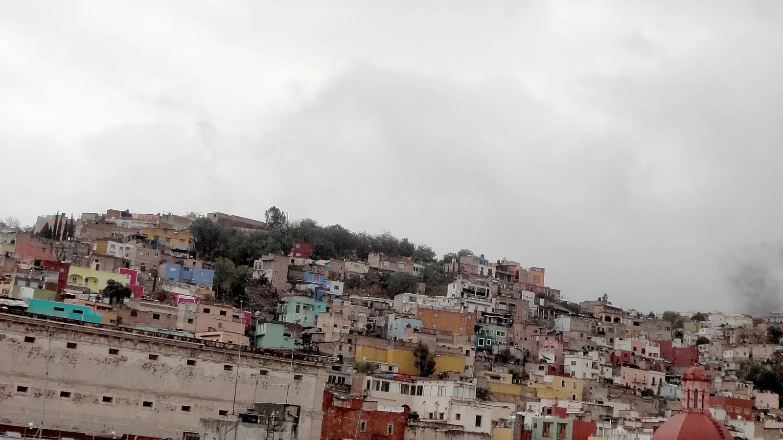 The colourful houses of Guanajuato packed into a hillside valley