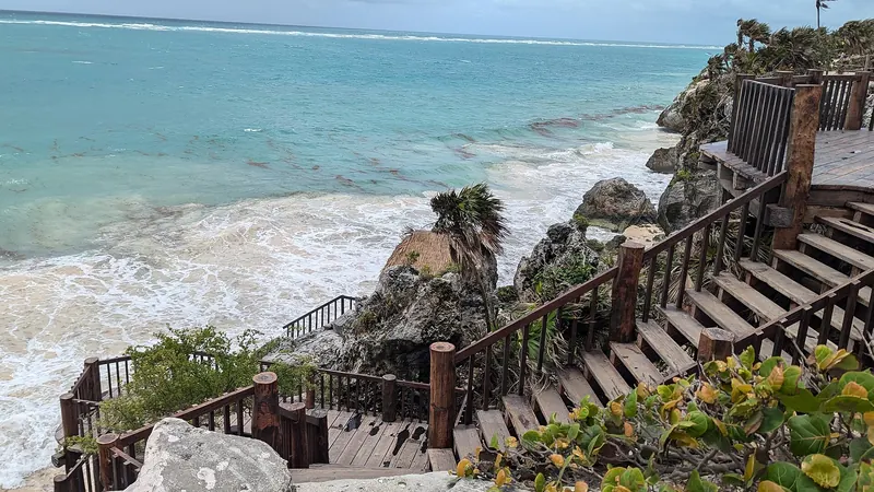 Stairs leading down to the Caribbean beach beside the Tulum Maya site