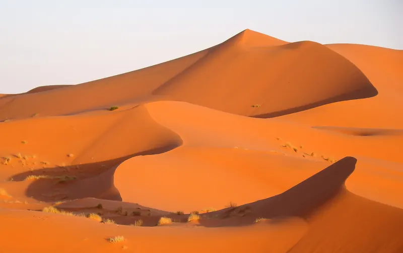 The orange sand dunes of Erg Chebbi near Merzouga in the Moroccan Sahara