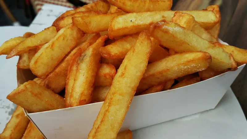 A portion of Dutch fries (patat) served in a paper cone