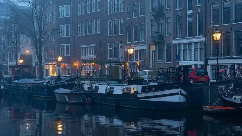 A canal crossing one of Amsterdam's Nine Streets shopping district