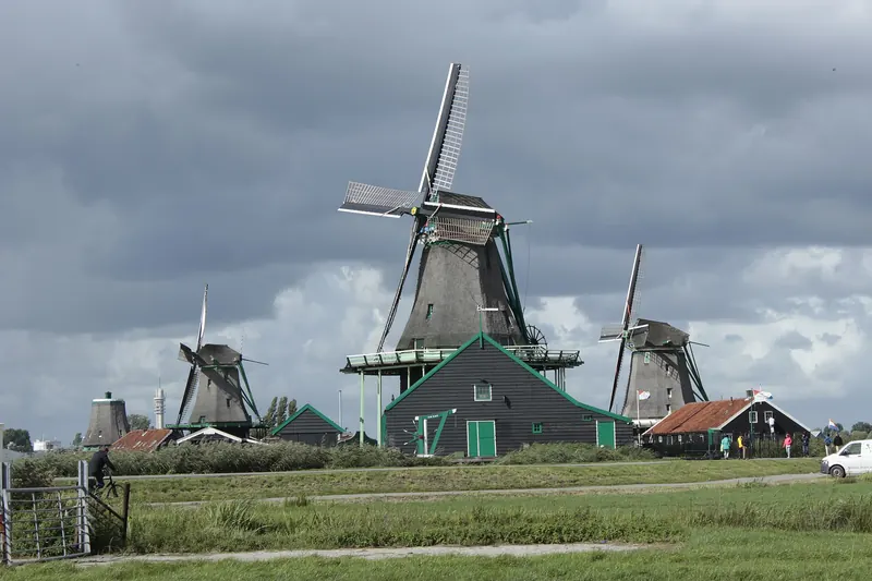 Historic windmills standing along the Zaan river at Zaanse Schans