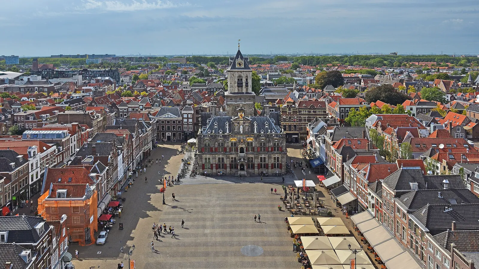 The Markt square in Delft, with the Nieuwe Kerk's spire rising above the historic buildings