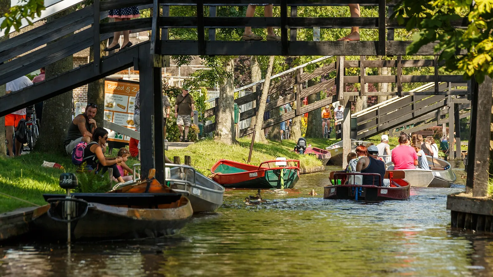 Thatched farmhouses along a canal in the car-free village of Giethoorn