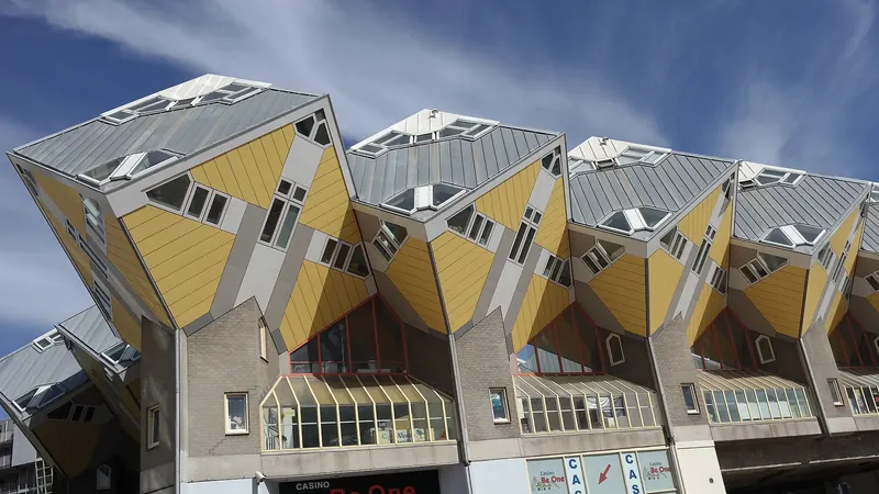 Rotterdam's tilted yellow Cube Houses, designed by architect Piet Blom