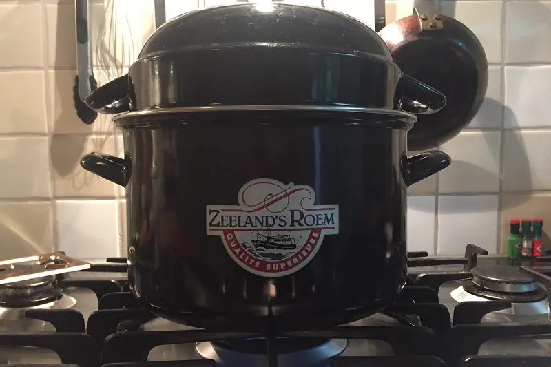 A pot of Zeeland mussels cooking, a classic Dutch coastal dish
