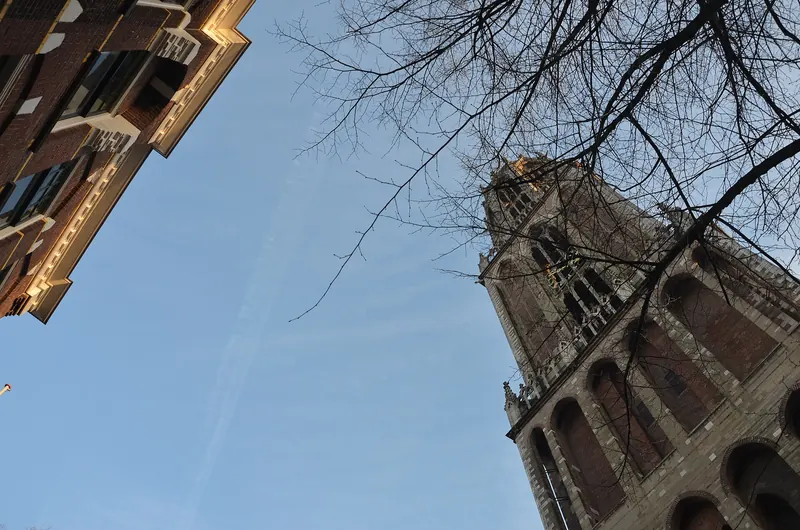 The Dom Tower rising above the rooftops of Utrecht