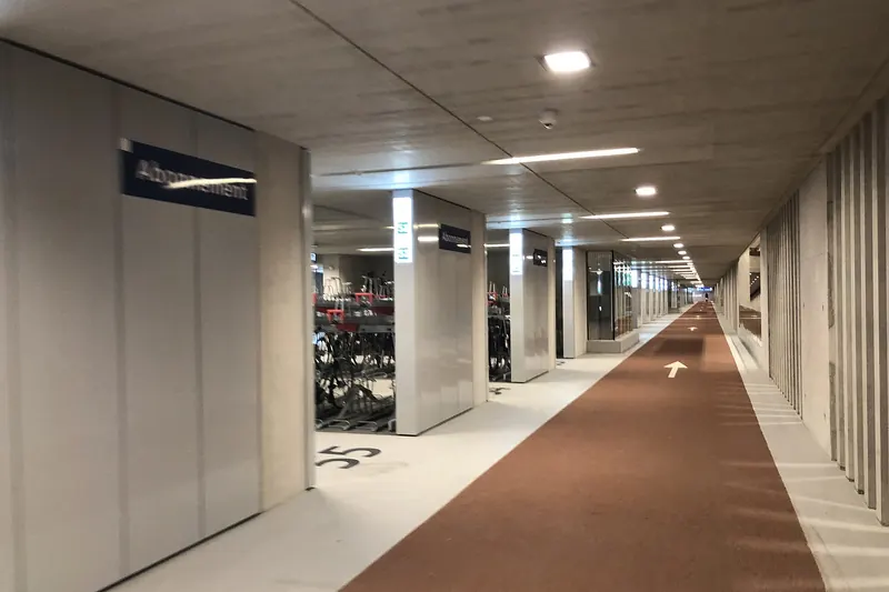 Rows of bicycles inside Utrecht Centraal's vast underground bike parking garage