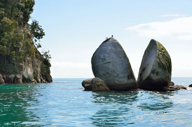 Split Apple Rock, a granite boulder split cleanly in two off the Abel Tasman coast