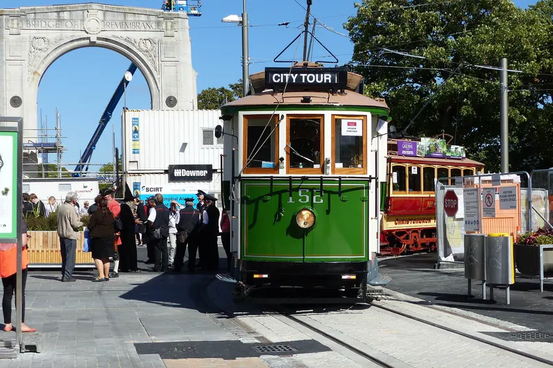 A restored heritage tram running through central Christchurch
